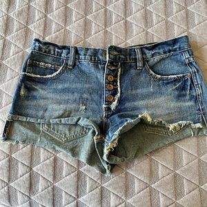 Free People dark denim distressed button fly shorts